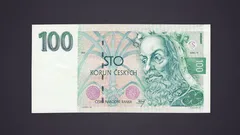 Česká bankovka 100 korun s portrétem Karla IV. na tmavém pozadí